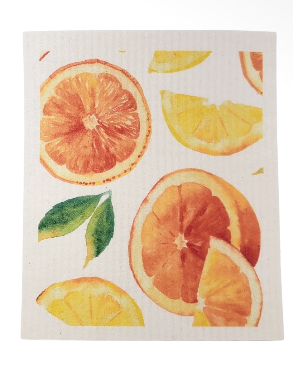 Swedish sponge dishcloth printed with watercolor citrus slices and a green leaf