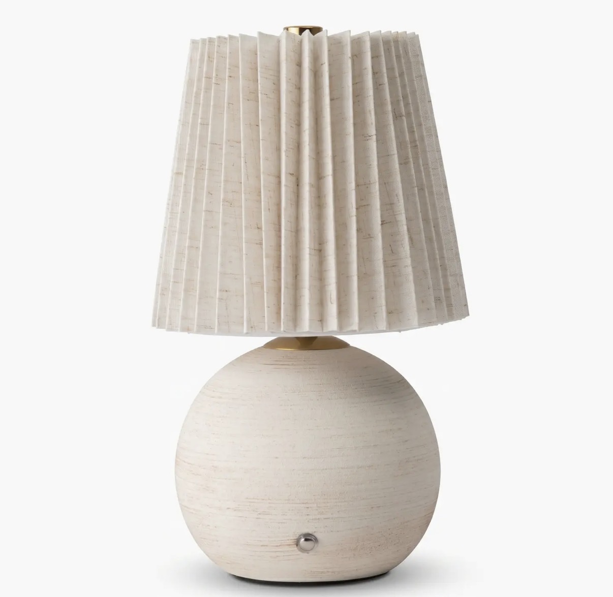 Ceramic Luna cordless table lamp with a pleated shade and gold accents on a white background